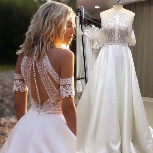 2021 Bridal Wedding Dress New Light Lace Satin Open Back Beaded A-Line White And Ground Tail Dress