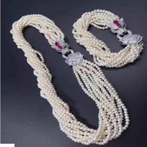 Beautiful 4-5 mm white pearl necklace 18" &bracelet 8" set