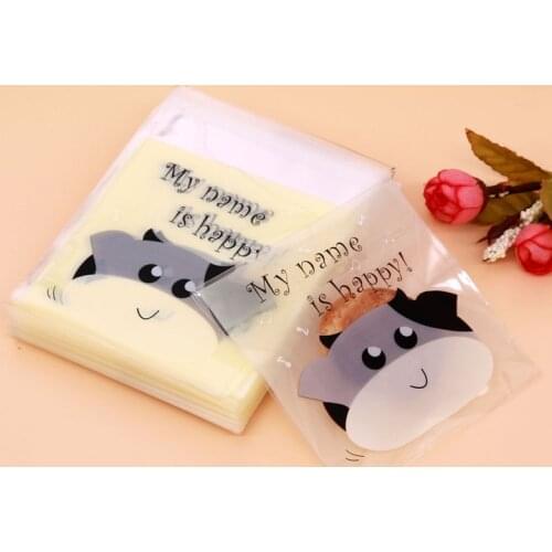 10x10+3cm 100pcs/lot Beige Happy Cattle Printed Self Seal Plastic Cookies Bag Gift Candy Package Bag for Biscuits Baking Cookies