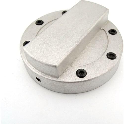 Automotive fuel tank cap with metal trim