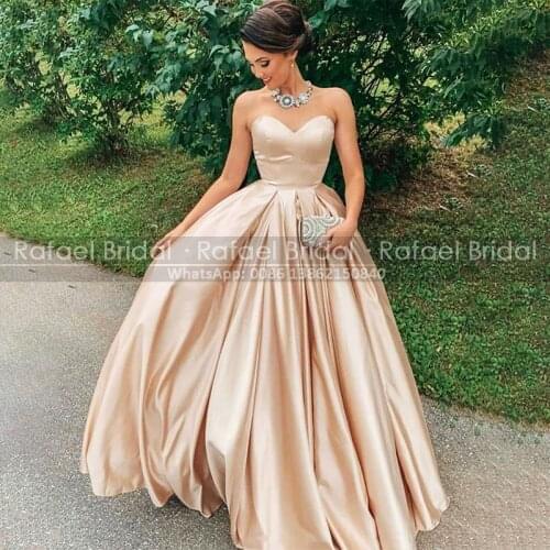 Puffy A Line Prom Dresses Lovely Sweetheart Backless Champagne Satin Party Wear Custom Made Floor Lenth Ruffle Princess Gown