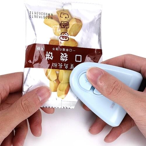 Sealing machine mini household vacuum snack compression sealing machine commercial hand sealing machine 7700