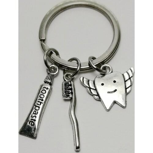Caring for teeth Keychain Mini toothpaste Toothbrush Key ring Childrens gifts Personality Creative Keychain Jewelry