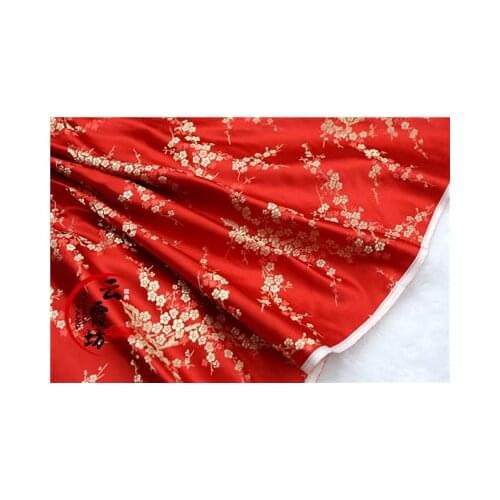 Qipao fabric ancient Chinese clothing baby clothes cos silk satin clothing fabric weaving brocade red bottom gold plum blossom