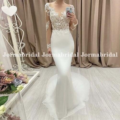 Illusion Long Sleeves Wedding Dress Skin Tulle Appliques Top Mermaid Bridal Dresses Buttons Back Robe De Mariée De Mariage