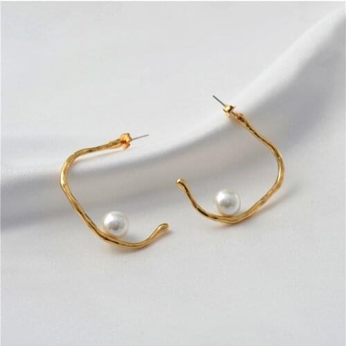 Pearl earrings female European and American design feeling brass retro exaggeration big earrings