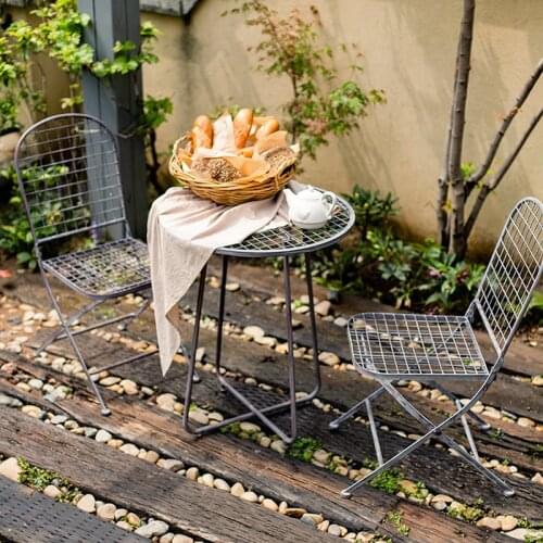 Retro rustic metal outdoor round table