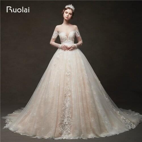 2020 Champagne Wedding Dresses Long Sleeve Ball Gown Wedding Gown Applique Flower Pearls Lace Bridal Gown Vestido de Noiva RW25