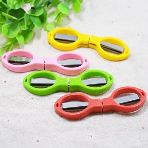 Specializing in the production of spectacles-shaped 8-word plastic shank scissors travel with convenient folding scissors