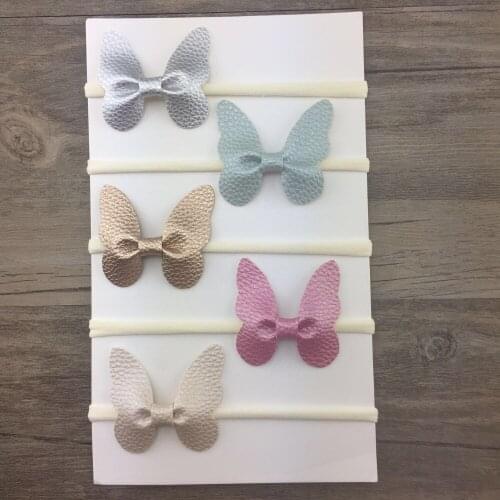 Boutique 12pcs Fashion Cute Leather Butterfly Newborn Soft Hair Bands Solid Hair Bow Nylon Headbands Headwear Accessories