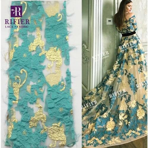 2020 High Quality Embossed Flower Embroidery African Nigerian Mesh Tulle Lace Fabrics Green Guipure Net Lace Wedding Material