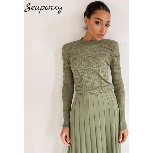 High-Quality Elegant WomenS Knitted Two-Piece Set 2021 Spring Sexy Hollow Short Top + High-Waist Pleated Skirt Casual Set