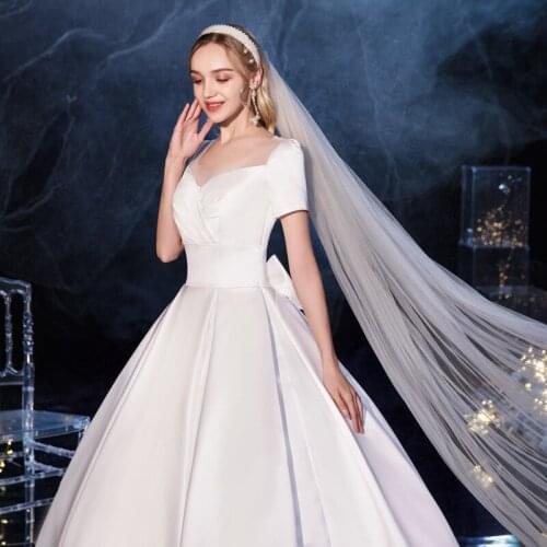 Ball Gown Floor-Length White Satin Lace-up Bowknot Wedding Dress White Satin V-Neck Short Sleeves Glamorous Married Apparel