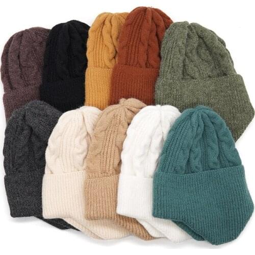Autumn and winter knitted hats for men and women to keep warm and thicken earmuffs, woolen caps, solid color hats