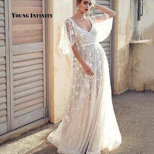 Boho Wedding Dresses 2020 Lace A-Line White Simple Bohemian Beach Wedding Dress Backless V Neck Floor Length Bridal Gown Vestido