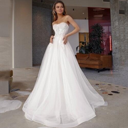 Sweetheart Lace Appliques Sleeveless Button Tulle A-Line Wedding Dress 2021 Vestido De Noiva Bridal Gown