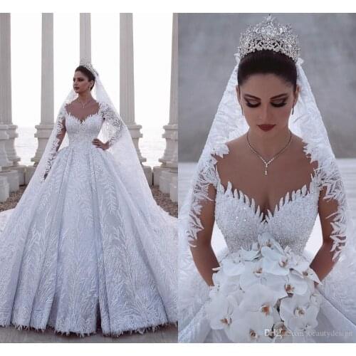 Hot Luxurious Beaded Arabic Ball Gown Long Sleeves Wedding Dresses Lace Tulle 3D Appliques Fitted Bridal Gowns Plus Size