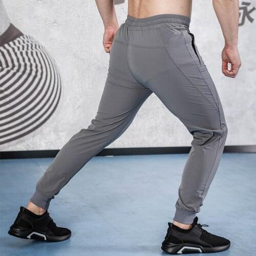 Mens and womens sweatpants ice silk fast - dry sweatpants mens and womens casual breathable training jogging pants