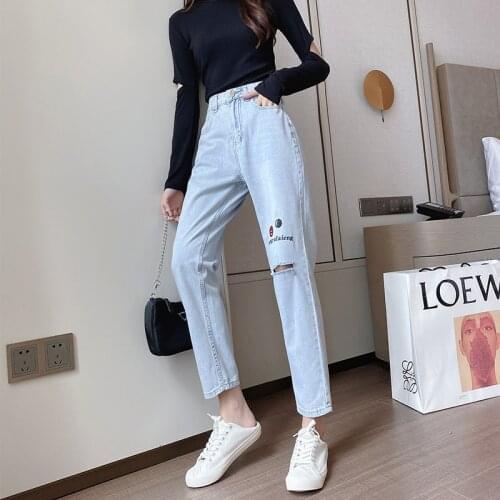 Spring new real shot womens loose and thin high waist jeans personality fashion smiling face holed Harem Pants