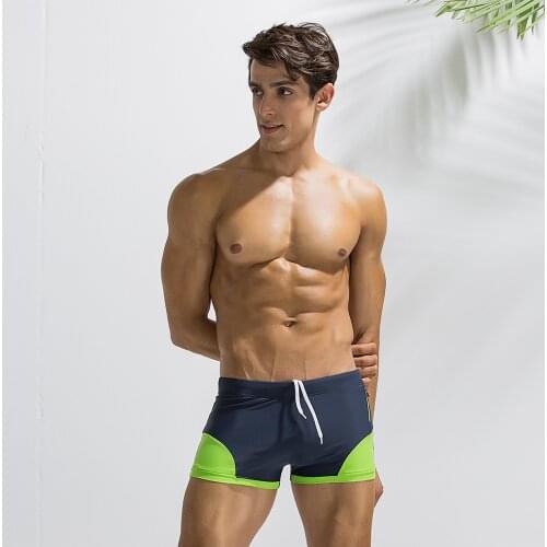 Summer Mens Brand New Sport Running Shorts Man Shorts Gym Pocket Straps Bodybuilding Male Fitness Beach Shorts 3 Colors