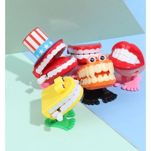 Funny Plastic Cartoon Teeth Denture Foot Clockwork Educational Developmental Toys Gift New
