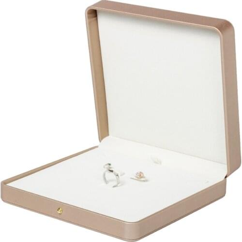 New Champagne Gold Pu Leather Square Jewelry Box For Storing And Displaying Rings Necklaces Earrings And Super Cost-effective