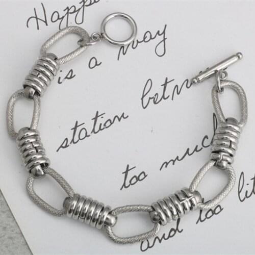 Fashion handmade OT buckle punk hip hop stainless steel O word tide men and women titanium steel word buckle bracelet