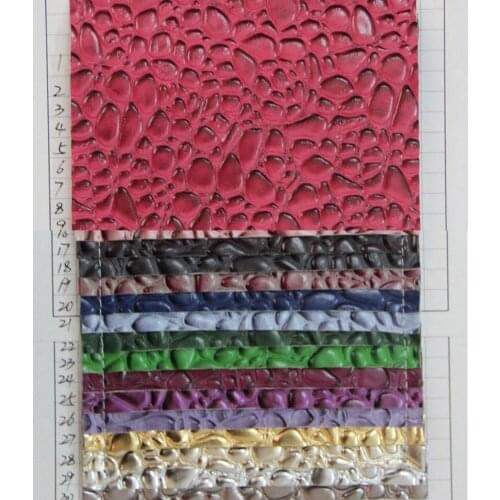 Wholesale PVC leather fabric brushed big and small stone grain leather material faux leather