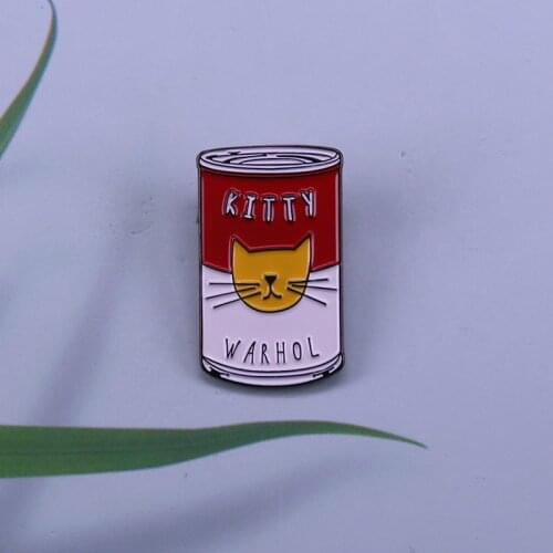 Kitty warhol enamel pin who was a leading figure in the visual art movement known as popular art