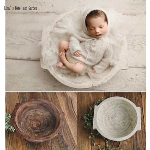 Newborn Girl Sleeping in handmade vintage Wooden Bowl