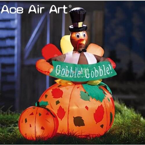 Gentleman Inflatable Turkey sitting on a pumpkin,Thanksgiving decoration airblown turkey