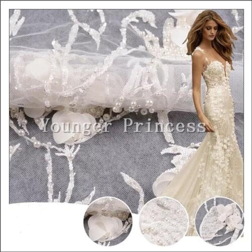 New design white unique beaded embroidered tulle lace fabric YG-750 Nigerian french tulle lace fabric for fashion show dress