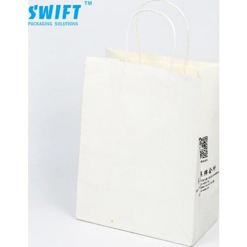 White luxury shopping paper bag
