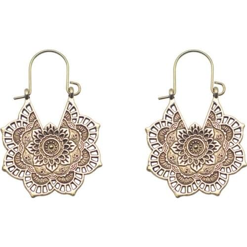 Retro ethnic metal hollow flower flower earrings Bohemian carved earrings charm earrings