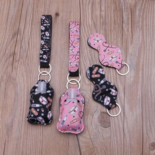 Portable 1 oz refillable empty travel bottle with keychain holder set wrist strap keychain bottle container with flip cap