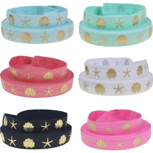 50 yards per roll,5/8" gold foil shell print fold over elastic foe elastic ribbon for hair accessories