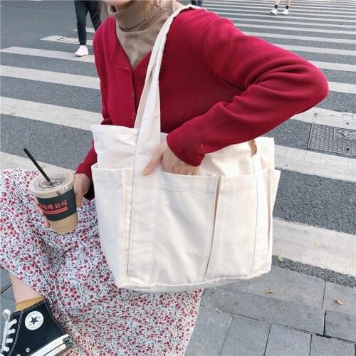 2020 new ins lazy style multi-pocket canvas bag large capacity wild commuter one-shoulder tote bag female students
