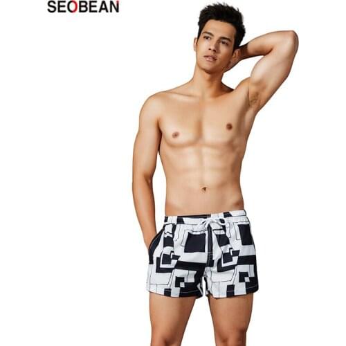SEOBEAN Mens Three Quick-Drying Loose Beach Holiday Leisure Shorts Summer Trend Black and White Surfing & Beach Shorts