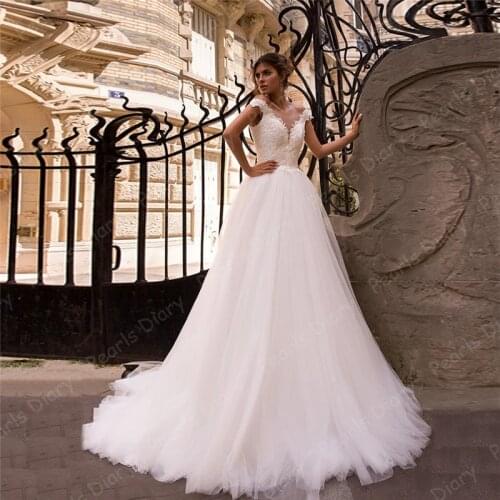 Charming Beading Wedding Dresses Vestidos De Noiva 2021 Elegant Cap Sleeve V Neck Applique Backless Bridal Dress Bridal Gowns