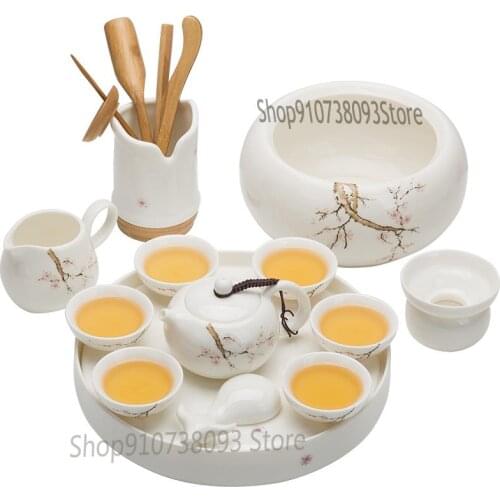 Complete set of Dehua White Porcelain Sheep Fat Jade Tea Set Household Yingqing Kung Fu Tea Set Ceramic Tea Tray Simple Tea Tabl