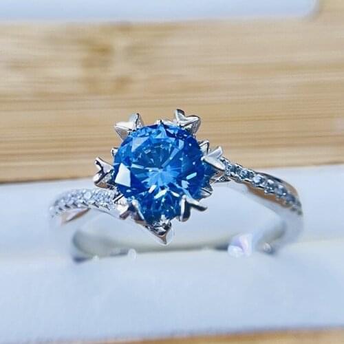 Independent design ocean blue diamond drop-shaped hand bouquet twisted arm love claw set ring ladies silver jewelry