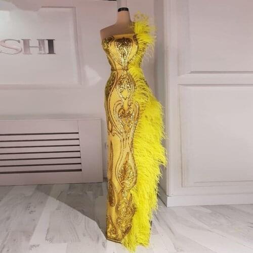 Fashion Gold Yellow Dubai Prom Dresses 2020 Long Mermaid Feathers Sequin Evening Party Gowns Strapless Sexy Robe De Soiree