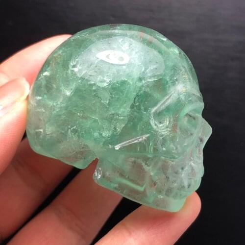 Natural fluorite crystal carved skull, healing meditation home decoration