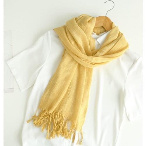Spring and autumn solid color cotton and linen scarf women retro striped travel sun protection warm gauze fringed headscarf shaw