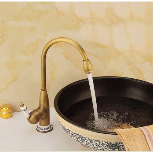 Antique Bronze Kitchen Faucets Retro Style Rotate Swivel Faucet Bathroom Hot Cold Water Tap Mixer Sitting Sink Faucet 1pcs