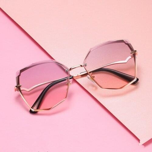 2021 new polygonal Sunglasses Womens cut edge ocean piece frameless Sunglasses European and American trend cats Eye Sunglasses