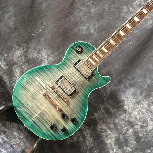 High quality electric guitar. Tiger pattern color can be customized, small eye bridge, free shipping