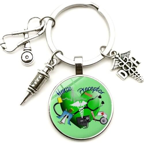 New Jewelry Antique DH Bump Glass Keychain Pendant Medical Sign Stethoscope Syringe Men and Women Car Keychain Gifts