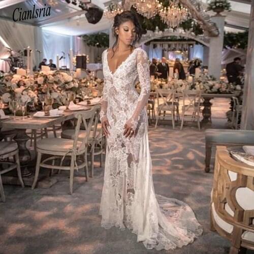 Romantic V-Neck Illusion Backless African Lace Mermaid Wedding Dress Long Sleeve Floral Appliques Dubai Bridal Gown