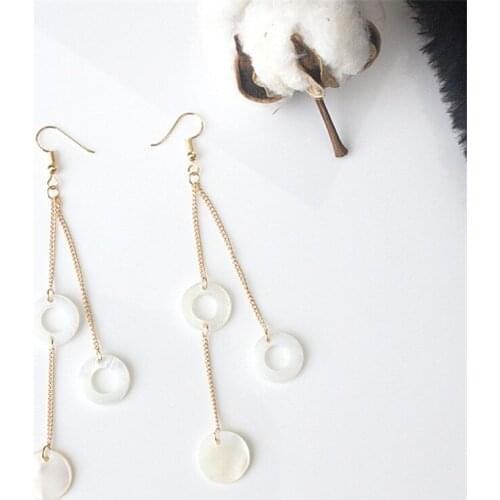 Fashion jewelry women long earrings elegant and charming round hollow earrings shell stud earrings new style party earrings